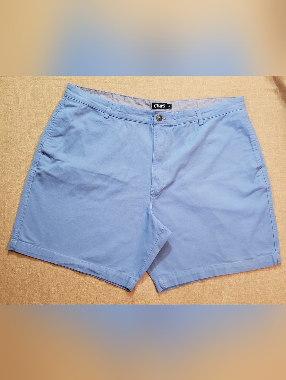 Chaps Men’s Light Blue flat front shorts.  Size 44.  Great condition.